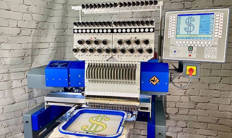 What is embroidery? Here is a large embroidery machine that most professionals use