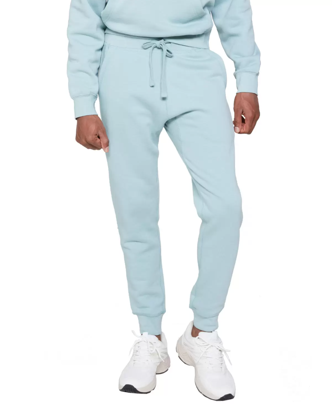 Person in Light Blue Sweat Suit