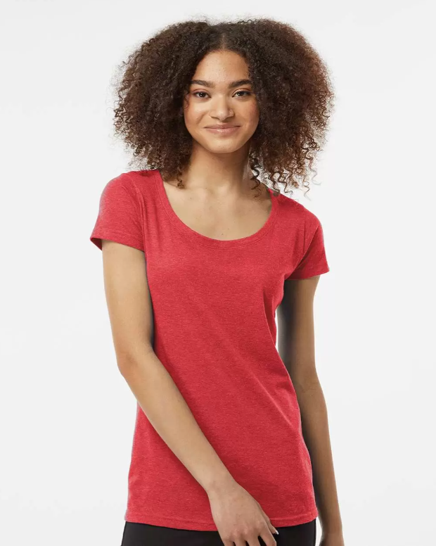 A woman wearing a plain red scoop neck t-shirt and black pants, standing against a white background.
